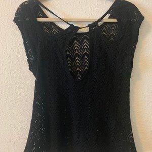 See through black t-shirt.